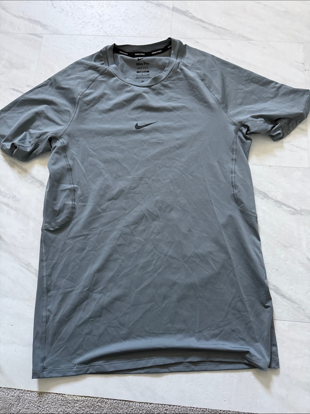 Nike Short Sleeve Athletic Tee in Gray with Black Swoosh